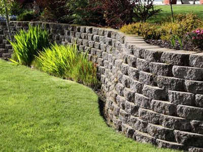 Retaining wall installation, removal and repair services for erosion control and landscape design from ZNT Property Services