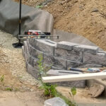 Retaining wall installation, repair and maintenance hardscaping services from ZNT Property Services.